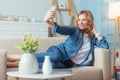 Positive smiling woman looking at the camera and posing for a photo Royalty Free Stock Photo