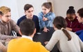 Classmates having round of Werewolf game at break between classes Royalty Free Stock Photo