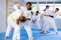 African american teenage girl practicing martial arts fighting techniques in sparring Royalty Free Stock Photo