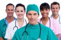 Positive surgeon and his medical team Royalty Free Stock Photo