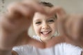 Positive sweet little preschool girl looking at camera Royalty Free Stock Photo