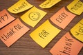 Positive and thankfull notes on a wooden background. Thanksgiving day Royalty Free Stock Photo
