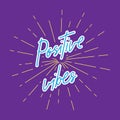 Positive vibes hand lettering with sunburst lines