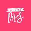Positive Vibes phrase. Modern typography. Vector illustration. Isolated on pink background.