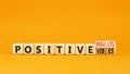 Positive vibes result symbol. Concept words Positive vibes or Positive results on cubes. Beautiful orange table orange background Royalty Free Stock Photo