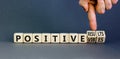 Positive vibes results symbol. Concept words Positive vibes or Positive results on cubes. Businessman hand. Beautiful grey table Royalty Free Stock Photo