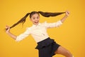 Positive vibes. School life concept. Celebrate knowledge day. Student little kid. Girl pupil on yellow background. Back