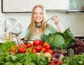 Positive woman cooking with soup ladle Royalty Free Stock Photo