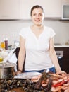 Positive woman with fresh raw sea food Royalty Free Stock Photo