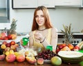 Positive woman making fruit salad with yoghourt Royalty Free Stock Photo