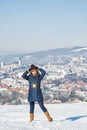 Positive woman posing in snowy landscape, Nitra