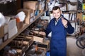 worker checking small details for sanitary engineering in workshop Royalty Free Stock Photo