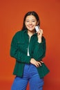 positive young asian woman in green Royalty Free Stock Photo