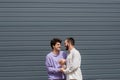 Positive and young homosexual couple holding Royalty Free Stock Photo