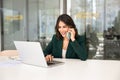 Positive young manager woman talking to client on mobile phone Royalty Free Stock Photo