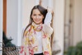 Positive young woman touching her long hair Royalty Free Stock Photo