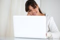 Positive young woman using her laptop computer Royalty Free Stock Photo