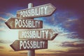 Possibility - wooden signpost, roadsign with four arrows Royalty Free Stock Photo