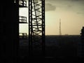 Silhouette of metal structures with gray sunset background