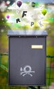 Post box with colorful letters Royalty Free Stock Photo