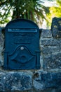 post box, embedded in a stone wall Royalty Free Stock Photo