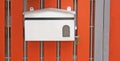 Post box on the front gate Royalty Free Stock Photo