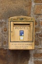 Post box on a wall in France