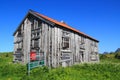 Post boxes and Old house of Fredvang Royalty Free Stock Photo