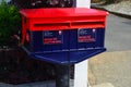 Post Boxes on Sidewalk in Takaka town New Zealand Royalty Free Stock Photo