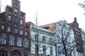 Post card view amber house in Germany Hamburg, european street and roofs closeup