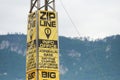 Post with information sign board about Zip line in Montenegro