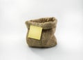 Post it label on burlap sack