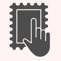 Post mark with hand glyph icon. Glue sticker and pointer. Postal service vector design concept, solid style pictogram on Royalty Free Stock Photo