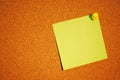 Post-it note on cork bord Royalty Free Stock Photo