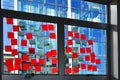 Post it notes on office building window