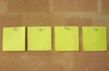 Post-it notes pinned in line