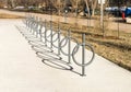 Post-and-ring style outdor metal bicycle parking racks at Fort Edmonton Park entrance Royalty Free Stock Photo