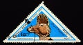 Triangle postage stamp 1997. Corythosaurus dinosaur