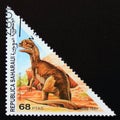 Triangle postage stamp 1997. Dilophosaurus dinosaur