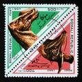 Triangle postage stamp 1997. Kritosaurus and Lambeosaurus dinosaur