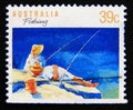 Postage stamp Australia, 1989. Couple Fishing in nature