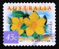 Postage stamp Australia, 1999. Guinea Flower Hibbertia scandens flower Royalty Free Stock Photo