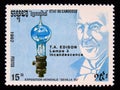 Postage stamp Cambodia 1992. Thomas Alva Edison portrait and light bulb Royalty Free Stock Photo