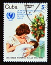 Postage stamp Cuba 1984. Mother breastfeeding Child