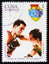 MOSCOW, RUSSIA - APRIL 2, 2017: A post stamp printed in Cuba shows two boxers, 4 Spartakiad, circa 1977