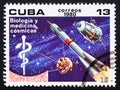 Postage stamp Cuba, 1980. Staff of Aesculapius, rocket and satellites