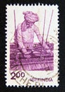 Postage stamp India, 1980. Worker Using a Handloom