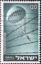 A post stamp printed in Israel showing an an a parachutist Israeli paratroopers in World War II Royalty Free Stock Photo