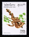 Postage stamp Laos, 1996. Indian Rock Python Python molurus snake Royalty Free Stock Photo