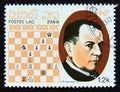 Postage stamp Laos, 1988. JosÃÂ© Raul Capablanca chess champion portrait